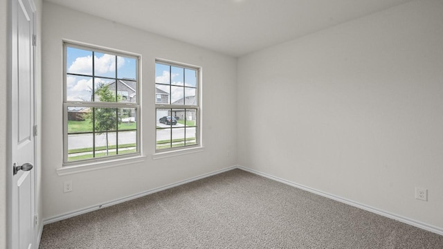 504 Drake Dr, Ferris, TX 75125 - unfurnished room with carpet floors and baseboards