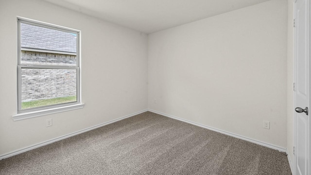 504 Drake Dr, Ferris, TX 75125 - carpeted spare room with healthy amount of natural light