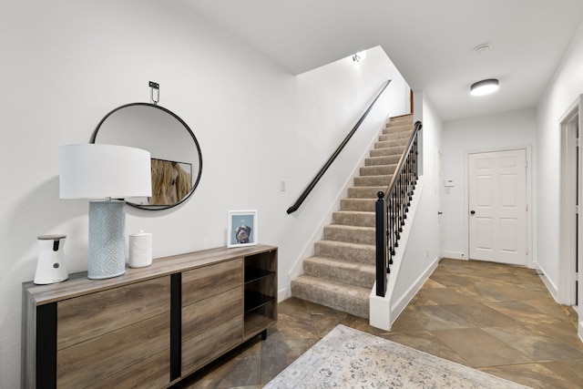 2408 Wild Cherry Way, Dallas, TX 75206 - stairs with stone finish flooring and baseboards