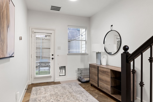 2408 Wild Cherry Way, Dallas, TX 75206 - entryway featuring plenty of natural light and baseboards