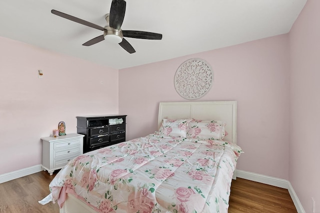 3039 Dutton Dr, Dallas, TX 75211 - bedroom featuring wood finished floors, baseboards, and ceiling fan
