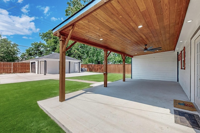 3039 Dutton Dr, Dallas, TX 75211 - view of patio / terrace with an outbuilding and ceiling fan
