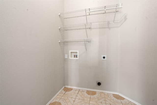 648 Tabasco Trl, Arlington, TX 76002 - laundry area with electric dryer hookup, hookup for a washing machine, and baseboards