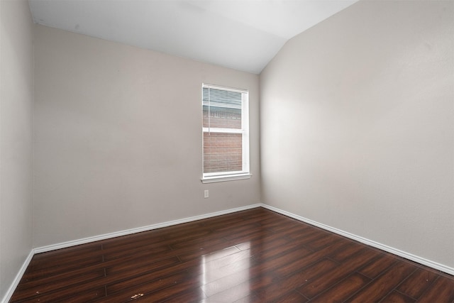 648 Tabasco Trl, Arlington, TX 76002 - unfurnished room with dark wood-type flooring, lofted ceiling, and baseboards