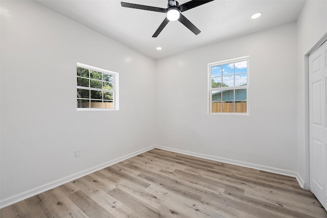 4100 N 30th St, Waco, TX 76708 - unfurnished bedroom with light wood-style flooring, baseboards, recessed lighting, and ceiling fan