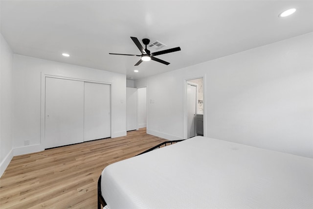 4100 N 30th St, Waco, TX 76708 - bedroom with wood finished floors, recessed lighting, baseboards, a closet, and a ceiling fan