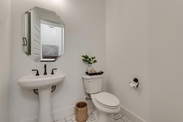 12104 Fairway Meadows Dr, Fort Worth, TX 76179 - half bath with toilet and tile patterned floors