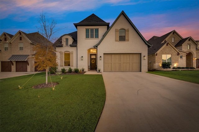 12104 Fairway Meadows Dr, Fort Worth, TX 76179 - french country home featuring a garage, driveway, and a yard