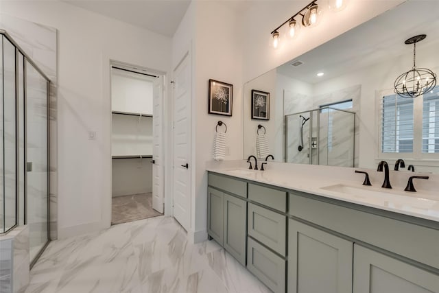 12104 Fairway Meadows Dr, Fort Worth, TX 76179 - full bathroom featuring a marble finish shower, double vanity, marble finish flooring, a walk in closet, and a chandelier