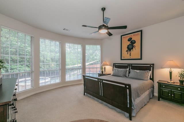 4757 Van Zandt Dr, Fort Worth, TX 76244 - bedroom featuring multiple windows, light carpet, and ceiling fan