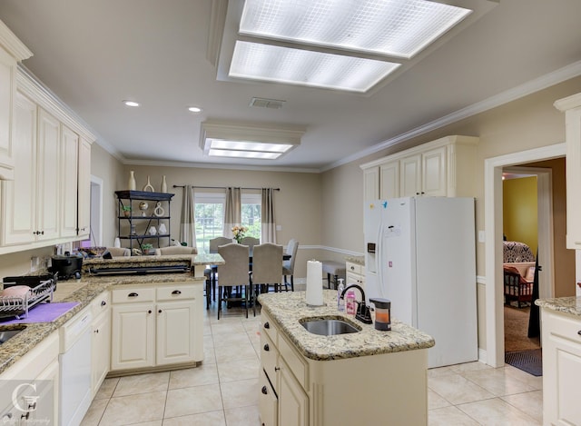 5345 Vermilion Pl, Keithville, LA 71047 - kitchen with white appliances, light tile patterned floors, crown molding, a peninsula, and light stone countertops