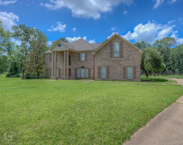 5345 Vermilion Pl, Keithville, LA 71047 - greek revival house featuring brick siding and a front lawn