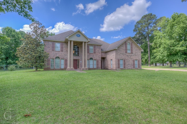 5345 Vermilion Pl, Keithville, LA 71047 - neoclassical home with brick siding and a front lawn