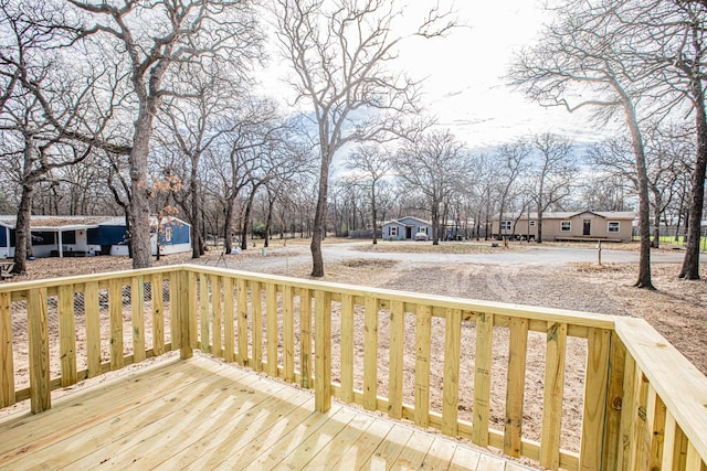 1613 Mockingbird Ln, Pelican Bay, TX 76020 - deck with a residential view and gravel driveway