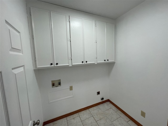 21992 Fm 226, Etoile, TX 75944 - washroom featuring cabinet space, hookup for an electric dryer, hookup for a washing machine, and baseboards
