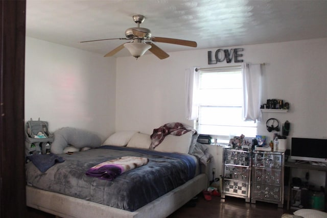 612 Ranier Cir, Garland, TX 75041 - bedroom featuring wood finished floors and a ceiling fan