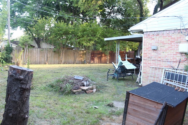 612 Ranier Cir, Garland, TX 75041 - view of yard with an outdoor fire pit