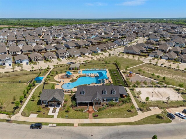 6122 Gully Grove Dr, Royse City, TX 75189 - aerial overview of property's location with a pool area and nearby suburban area