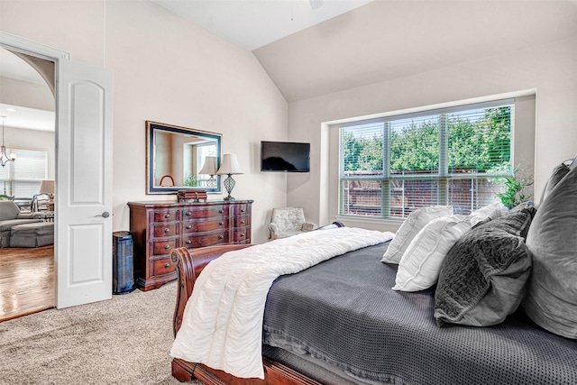 2305 Kemerton, Plano, TX 75025 - bedroom with lofted ceiling, arched walkways, carpet, and a chandelier