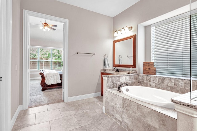 2305 Kemerton, Plano, TX 75025 - ensuite bathroom featuring a bath, baseboards, ceiling fan, tile patterned floors, and vanity