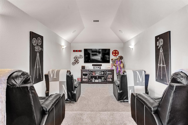 2305 Kemerton, Plano, TX 75025 - home theater room featuring light carpet and vaulted ceiling
