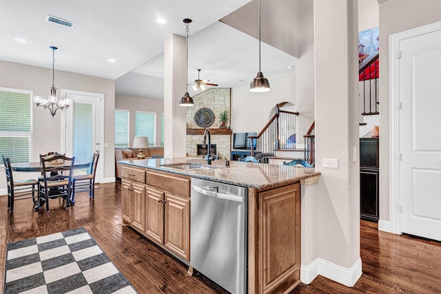 2305 Kemerton, Plano, TX 75025 - kitchen with dishwasher, a sink, open floor plan, a chandelier, and a ceiling fan