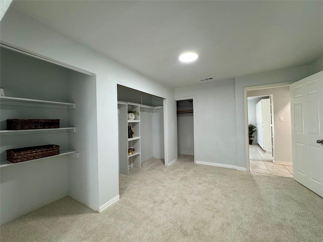 3107 Hale Ave, Fort Worth, TX 76106 - unfurnished bedroom featuring carpet, a closet, and baseboards