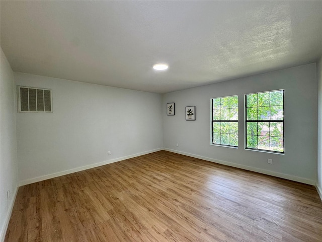 3107 Hale Ave, Fort Worth, TX 76106 - empty room featuring wood finished floors and baseboards