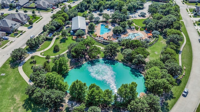 9820 Surveyor Rd, Little Elm, TX 75068 - aerial view of property and surrounding area with a pool, a large body of water, and nearby suburban area