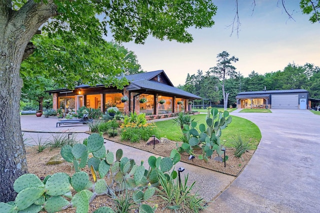 4034 Fm 2645, Savoy, TX 75479 - view of front of property with a garage, concrete driveway, and a front yard