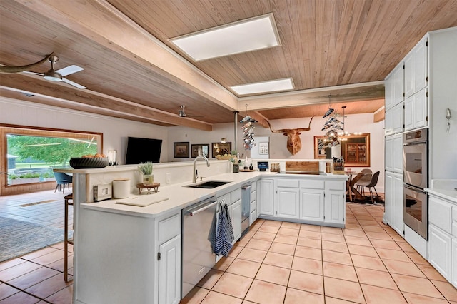 4034 Fm 2645, Savoy, TX 75479 - kitchen featuring a sink, appliances with stainless steel finishes, wooden ceiling with exposed beams, light tile patterned floors, and light countertops