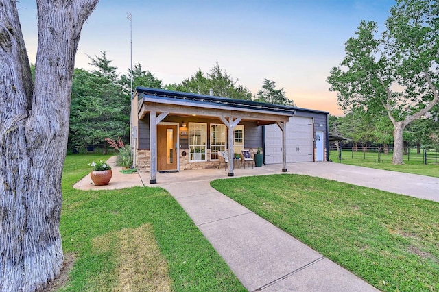 4034 Fm 2645, Savoy, TX 75479 - view of front facade featuring concrete driveway and a garage