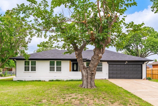 214 Betty Dr, Richardson, TX 75081 - ranch-style house with concrete driveway, an attached garage, brick siding, and a shingled roof