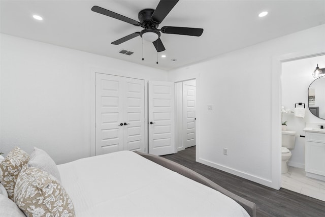 214 Betty Dr, Richardson, TX 75081 - bedroom with recessed lighting, a closet, connected bathroom, baseboards, and wood finished floors