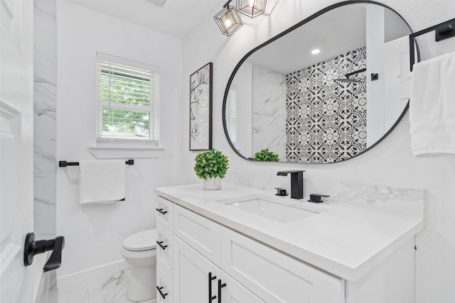 214 Betty Dr, Richardson, TX 75081 - full bathroom featuring marble look tiles, vanity, baseboards, toilet, and a shower