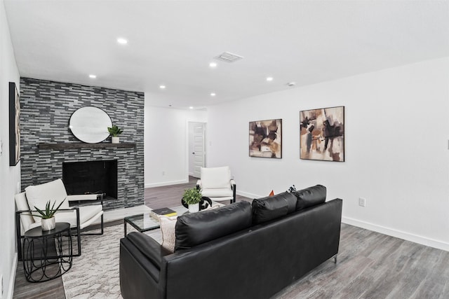 214 Betty Dr, Richardson, TX 75081 - living room featuring a tile fireplace, wood finished floors, recessed lighting, and baseboards