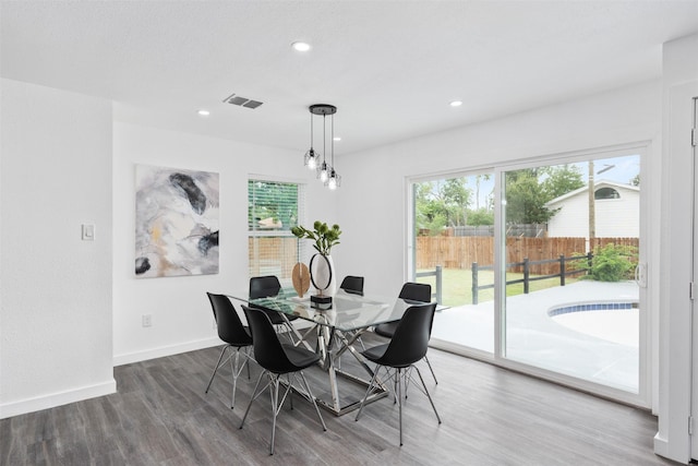214 Betty Dr, Richardson, TX 75081 - dining room featuring wood finished floors, baseboards, and recessed lighting