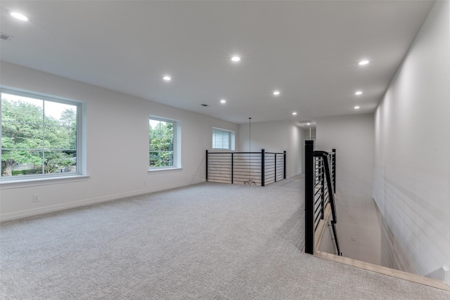 11207 Dwarfs Cir, Dallas, TX 75229 - empty room with recessed lighting and light colored carpet