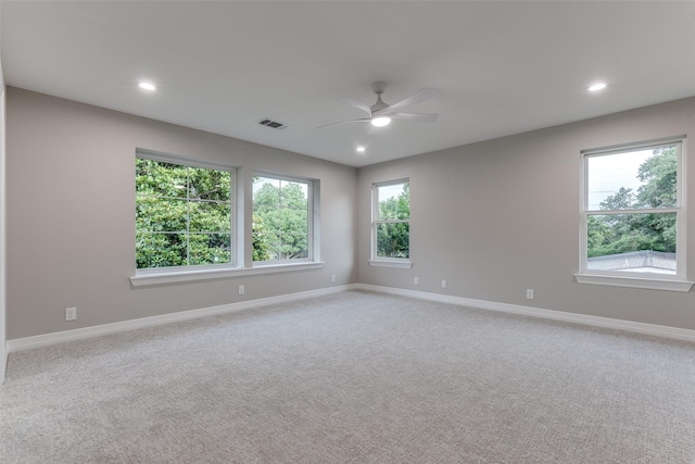 11207 Dwarfs Cir, Dallas, TX 75229 - empty room with a ceiling fan, light carpet, and recessed lighting