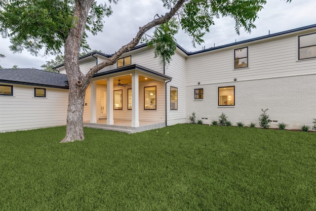 11207 Dwarfs Cir, Dallas, TX 75229 - rear view of house with ceiling fan, a yard, a patio, brick siding, and crawl space