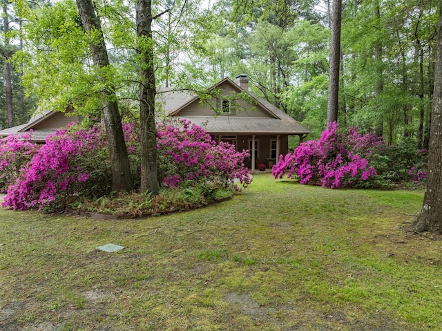 17889 County Road 134, Flint, TX 75762 - view of grassy yard with a porch