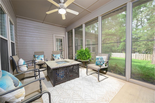 17889 County Road 134, Flint, TX 75762 - sunroom with a fire pit and a ceiling fan