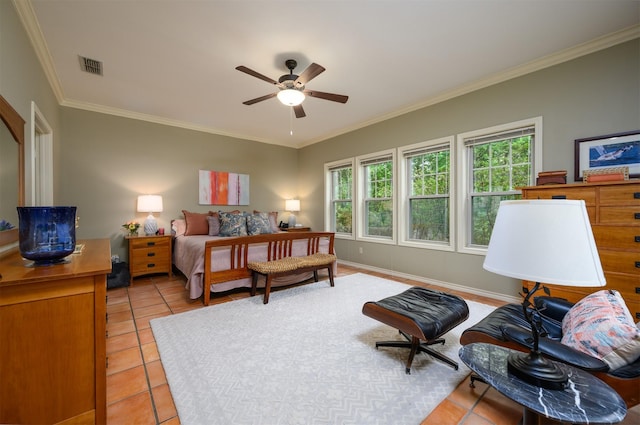 17889 County Road 134, Flint, TX 75762 - bedroom with light tile patterned flooring, ornamental molding, and a ceiling fan