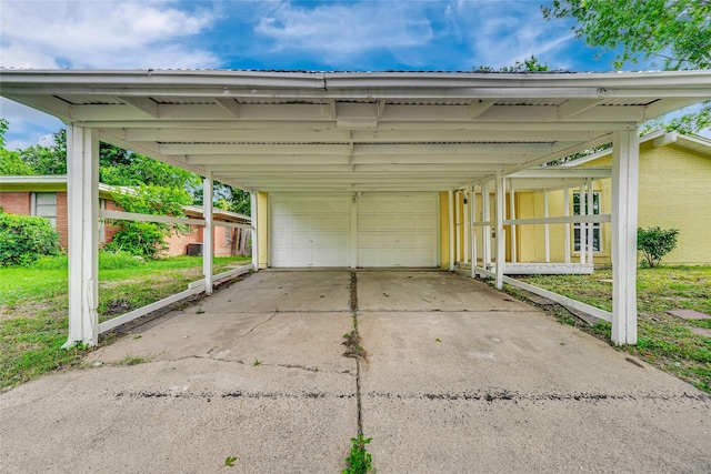 6825 John Dr, Richland Hills, TX 76118 - view of parking / parking lot featuring a detached garage