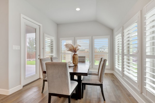 504 Arrowhead Ln, Haslet, TX 76052 - dining space with hardwood / wood-style floors, plenty of natural light, vaulted ceiling, and recessed lighting