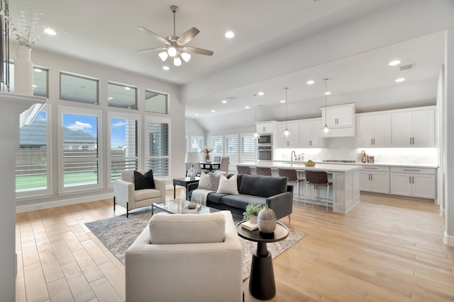 504 Arrowhead Ln, Haslet, TX 76052 - living area featuring light wood-style floors, a ceiling fan, and recessed lighting