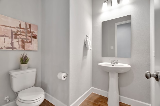 504 Arrowhead Ln, Haslet, TX 76052 - half bath featuring toilet and wood finished floors