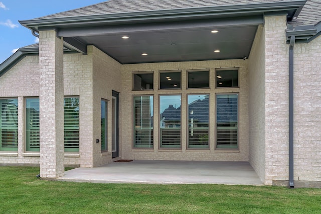 504 Arrowhead Ln, Haslet, TX 76052 - rear view of house with a patio area, roof with shingles, and a yard