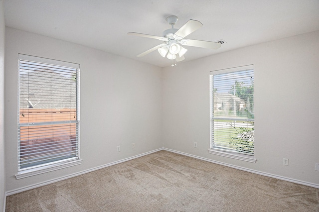 2109 Timber Cove Ct, Weatherford, TX 76087 - empty room with carpet flooring, baseboards, and ceiling fan
