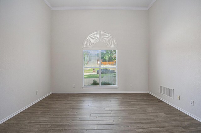 2109 Timber Cove Ct, Weatherford, TX 76087 - unfurnished room with dark wood finished floors, ornamental molding, and baseboards